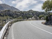 Mallorca Mountains: Asphalt Road Amidst a Picturesque Landscape