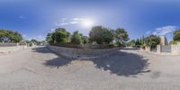 the 360 panoramic photo was taken in this country side neighborhood of an outdoor area