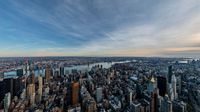 the view of manhattan is shown from a sky view high above it's surrounding skyscrapers