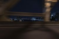 Manhattan Evening: Reflections of the City Lights