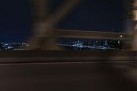 Manhattan Evening: Reflections of the City Lights