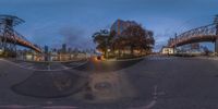 two 360 - view images of a city at night taken from the same point of view