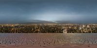 this is an image of the view from above a roof in a city at night