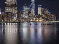 Manhattan Cityscape at Night: A Reflection of the City