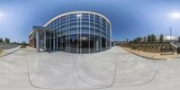 a 360 - view picture shows the inside of a building with many floors and an outside courtyard