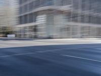 Metropolitan Berlin: Dynamic Cityscape with Urban Architecture and Tree-Lined Roads