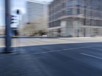 Metropolitan Berlin: Dynamic Cityscape with Urban Architecture and Tree-Lined Roads