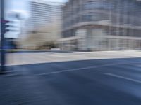 Metropolitan Berlin: Dynamic Cityscape with Urban Architecture and Tree-Lined Roads