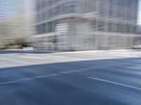 Metropolitan Berlin: Dynamic Cityscape with Urban Architecture and Tree-Lined Roads