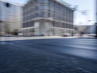 Metropolitan Berlin: Dynamic Cityscape with Urban Architecture and Tree-Lined Roads