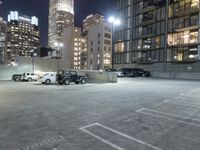 the car park is located directly above the surrounding buildings at night time by moonlight lights