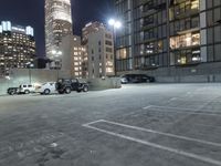 the car park is located directly above the surrounding buildings at night time by moonlight lights