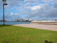 this is an image of a beachfront scene with the city in the background with an airplane on it