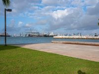 this is an image of a beachfront scene with the city in the background with an airplane on it