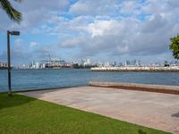 this is an image of a beachfront scene with the city in the background with an airplane on it