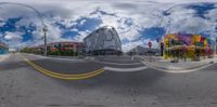 a series of different 360 - view shots show a street scene in a distorted image