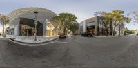 a 360 - image shows several photos of trees on a city street during the day