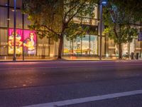 the city street is empty except for people to see at night time of this time of day