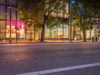 the city street is empty except for people to see at night time of this time of day