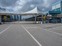 the parking lot is empty and ready for people to walk in the area of the airport