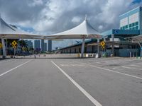 the parking lot is empty and ready for people to walk in the area of the airport