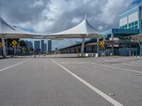 the parking lot is empty and ready for people to walk in the area of the airport