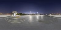 a photo of a parking lot with multiple ramps under construction at night time at the edge