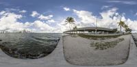 a group of three fisheye pictures of an ocean near the city and beachfront