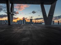 a cloudy view of the setting sun from a rooftop in miami, flo, usa