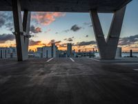 a cloudy view of the setting sun from a rooftop in miami, flo, usa