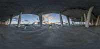 a 360 - ball view from the inside of an airport terminal with a sky background