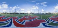 this is a 3d view of the inside of the stadium with a painted logo on the field