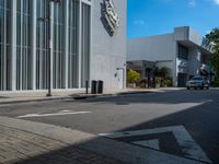 an empty street in an old fashion shopping district with no traffic or cars on it