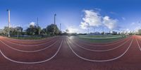 a 3d rendering image of a track with poles and lighting poles surrounding it and the sky in the background