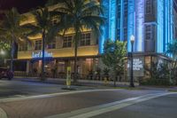 a very nice hotel with lights on at night time time in miami beach, florida
