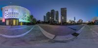 this is an image of a fish eye lens effect using photoshopped images of the street and city skyline