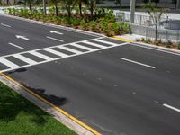 this road is running parallel between the two parking areas and in front of an office building