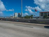 this is an image of a city overpass with traffic at low speed and speed