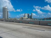 this is an image of a city overpass with traffic at low speed and speed