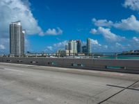 this is an image of a city overpass with traffic at low speed and speed