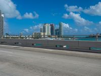 this is an image of a city overpass with traffic at low speed and speed