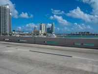 this is an image of a city overpass with traffic at low speed and speed