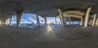 a view of a building from inside of a fisheye lens with a very long ceiling