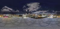 this is the view of a large circular photograph, taken from below on a rooftop in japan