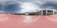 a view of a wide angle shot of an airport terminal from a fisheye lens