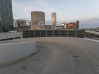 a man riding a skateboard down the side of a ramp on a city street