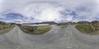 this is a mirror - like photo of a road and a mountain view in a 3d viewer