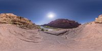 an image of a desert in 360 - view taken with a fisheye lens and an hdr