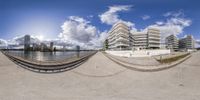 the view from a fish - eye lens shows the building, which is a modern apartment complex