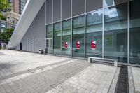 some very nice buildings that have banners in front of them at the doors of the building